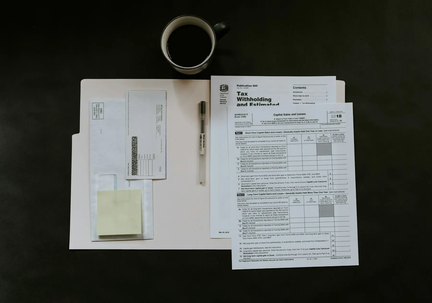 Financial statements and paperwork on a desk (illustrative stock photo)